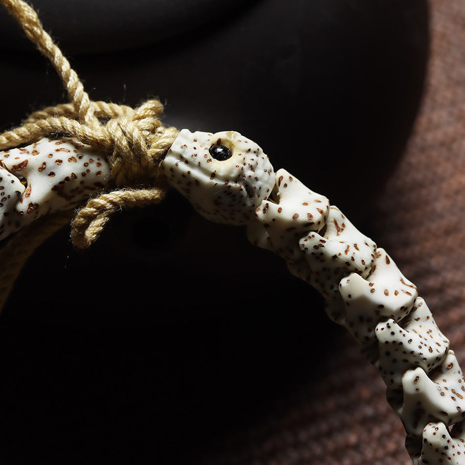 Bracelet sculpté en os de serpent de Bodhi Xingyue de l'écologie originale de Hainan