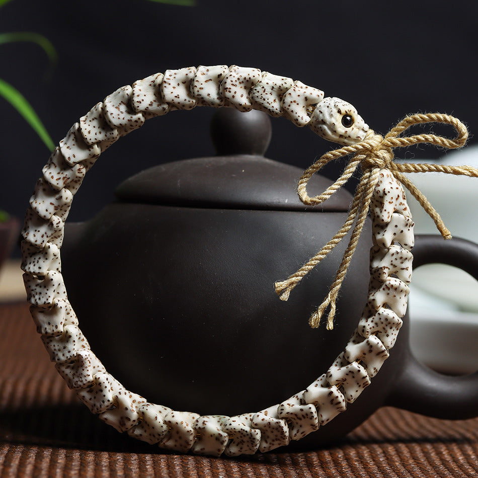 Bracelet sculpté en os de serpent de Bodhi Xingyue de l'écologie originale de Hainan